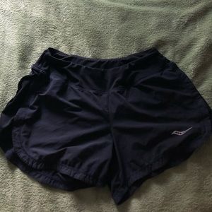 black saucony running shorts, size small